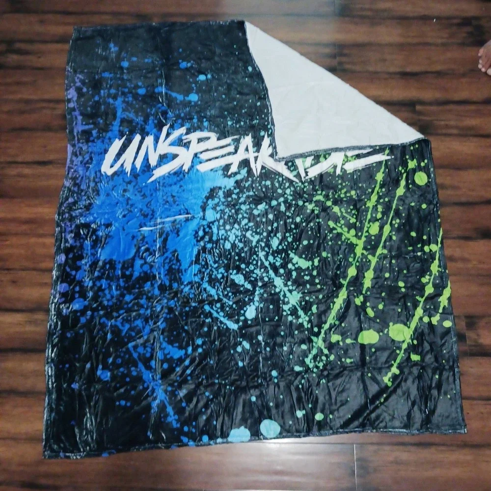 Unspeakable Gaming Fleece Blanket 50x40 Blue Green Paint Splatter Logo Throw